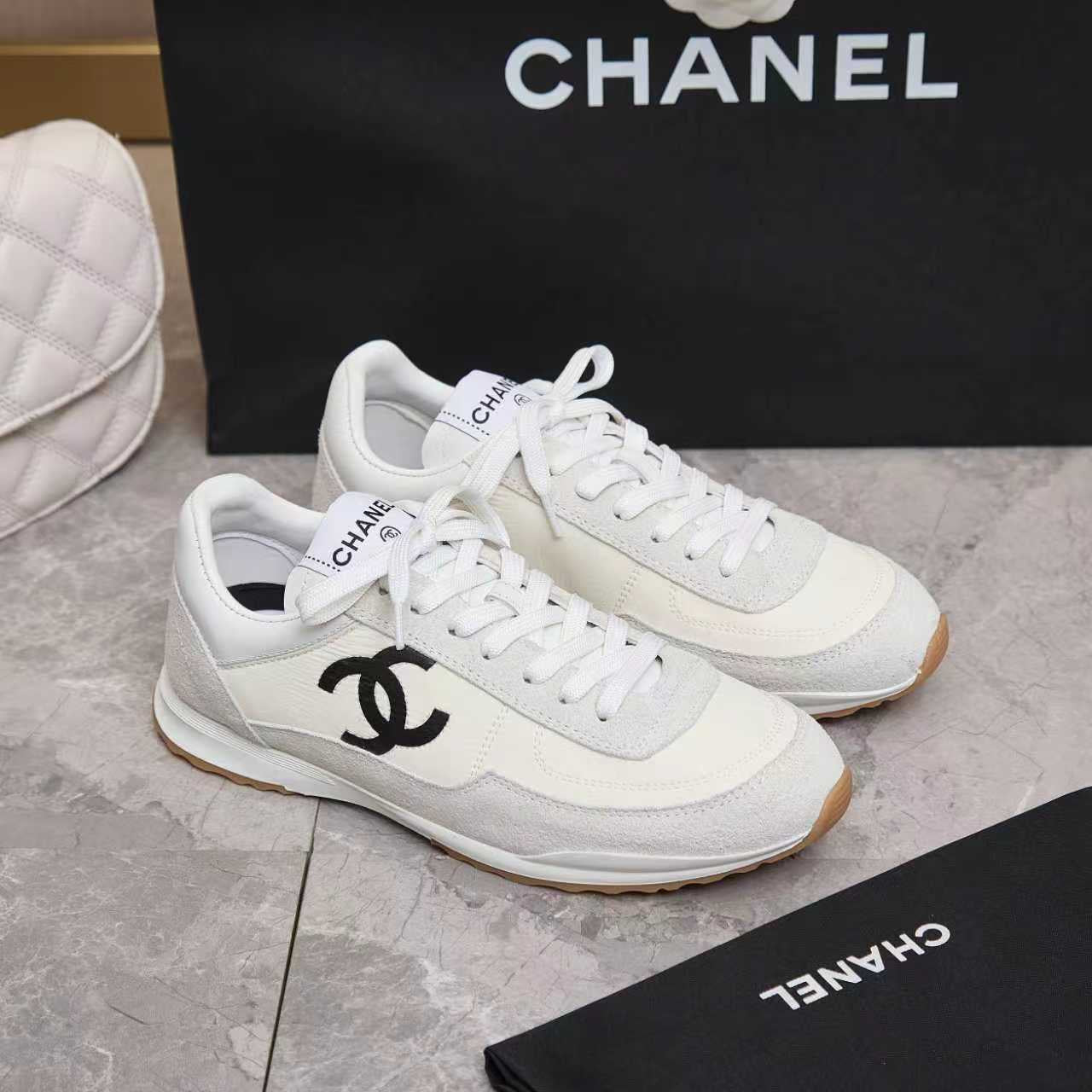 Chanel 2026 Sneaker White Black Fabric And Embossed Suede Calfskin