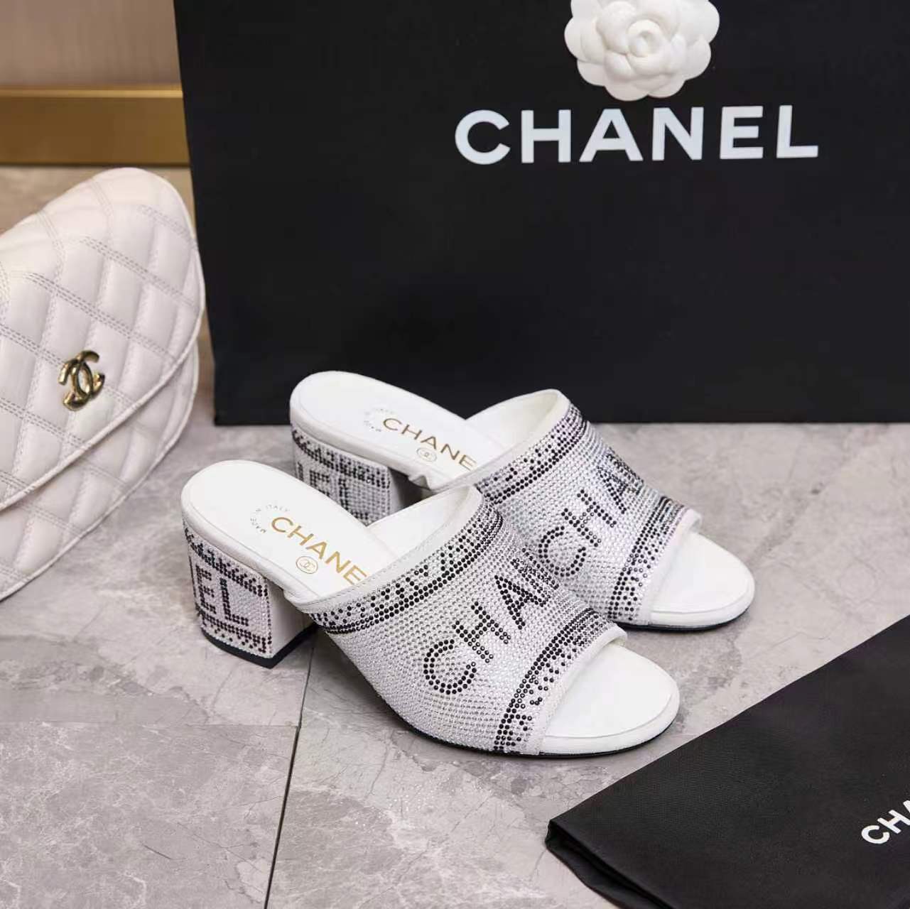 Chanel 2026 Rhinestone Mules Block Heel And Lettered Design Leather 778400