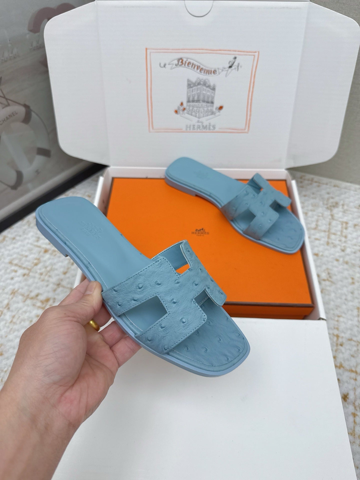 HM 26ss Oran Sandals Light Blue Ostrich Leather 625103