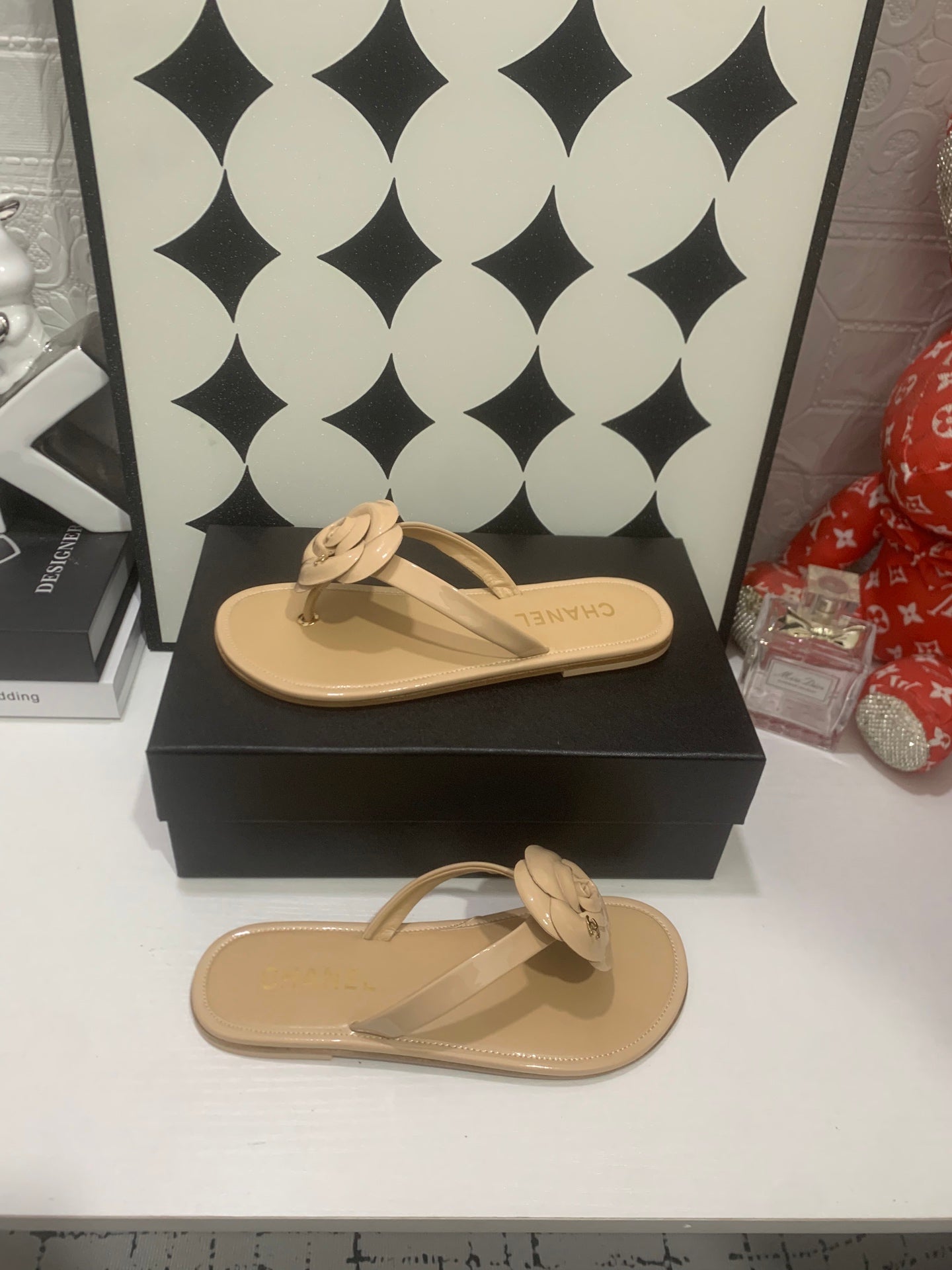 Chanel 2026 Camellia Flip-Flops Patent Calfskin 802344
