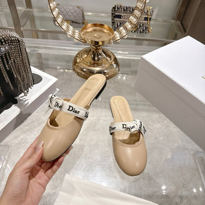 CD 26 Bow Flat Mules Embroidered Sheepskin