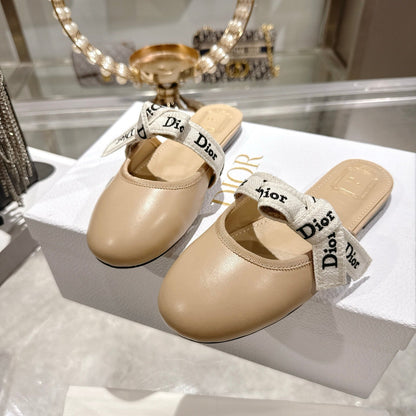 CD 26 Bow Flat Mules Embroidered Sheepskin