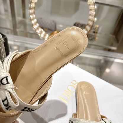 CD 26 Bow Flat Mules Embroidered Sheepskin
