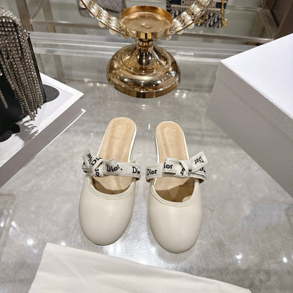 CD 26 Bow Flat Mules Embroidered Sheepskin